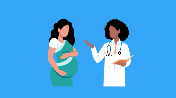 A doctor talking to a pregnant person.